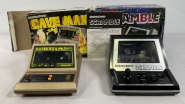 RETRO GAMING - Two boxed Grandstand electronic mini arcade games - SCRAMBLE and CAVEMAN, both boxed,