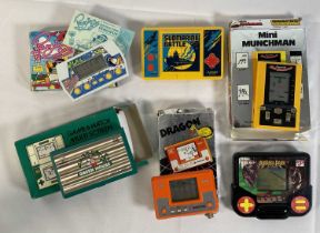 A collection of 1980s / 90s handheld video games to include a boxed Green House GH-54, Game and