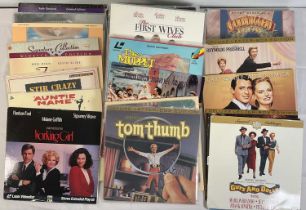 A collection of laserdisc movies, mostly comedy and musical titles including 101 DALMATIANS (