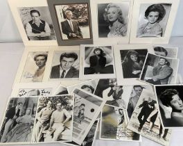 A collection of movie star autographed promotional stills including GREER GARSON, VIRGINIA O'