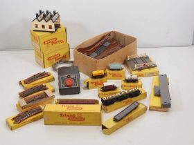 A tray of TRIANG TT scale model railway items comprising wagons, buildings, accessories and