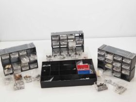 A large crate of N gauge white metal parts and accessories - ex stock from a kit casting company -