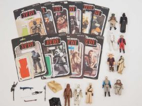 A group of vintage Star Wars KENNER and PALITOY figures together with some of the figure backing