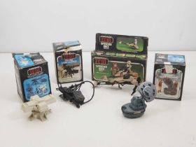 A group of vintage Star Wars (Return of the Jedi) guns and vehicles in original boxes - G in F/G