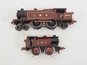 A pair of HORNBY O gauge 20V electric steam locomotives comprising a No.2 4-4-2 and an M3 tank