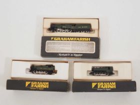 A pair of GRAHAM FARISH N gauge steam locomotives together with a kit built example on a FARISH