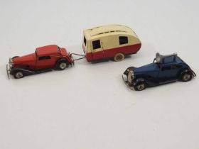 A group of vintage TRIANG MINIC clockwork cars and caravan as lotted - F/G (unboxed) (3)