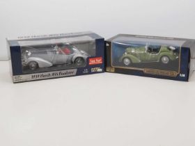 A pair of 1:18 scale diecast cars by SUNSTAR and RICKO comprising a Horch 855 Roadster and a