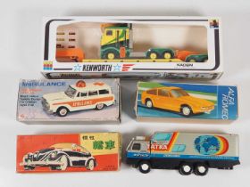 A quantity of plastic and tinplate model vehicles from Eastern European and Chinese