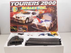 A SCALEXTRIC 'Tourers 2000' slot racing set, appears complete - VG in G box