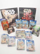 A large quantity of modern Star Wars figures and accessories together with a vintage Masters of
