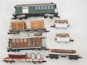 A group of G scale American Outline rolling stock, mostly scratch built on ready to run chassis,