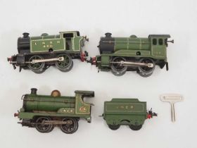A group of HORNBY O gauge clockwork locomotives all in LNER livery, one tender missing - with one