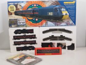 A HORNBY OO gauge GNER high speed train passenger train set, appears complete together with an