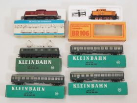 A group of HO gauge German and Austrian Outline locomotives and rolling stock by PIKO and