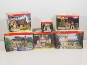 A town of HORNBY SKALEDALE OO gauge resin buildings to include some early release examples - all