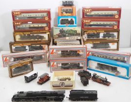 A quantity of boxed and unboxed OO gauge locomotives and rolling stock by AIRFIX, LIMA, MAINLINE and