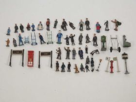 A quantity of diecast platform and station figures and accessories - mostly HORNBY O gauge - F/G (