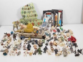 A large quantity of Star Wars / Empire Strikes Back / Return of the Jedi figures, weapons and
