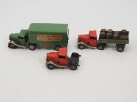 A pair of vintage TRIANG MINIC clockwork articulated lorries, comprising a Brewery and Removals