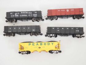 A group of G scale American Outline coal gondola cars in various liveries by BACHMANN all with