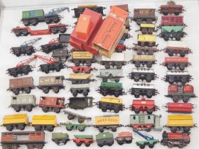 A very large tray of boxed and unboxed HORNBY SERIES O gauge wagons, few A/F mostly complete - F/G