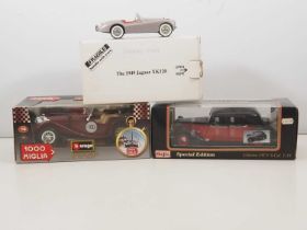 A pair of 1:18 scale diecast cars by BBURAGO and MAISTO together with a 1:24 scale DANBURY MINT