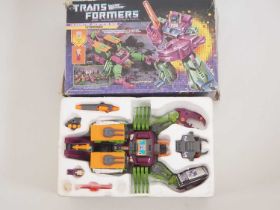 An original HASBRO Transformers Head Master Decepticon Base 'Scorponok' in the original box, appears