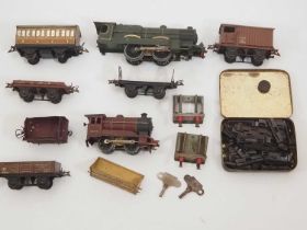 A quantity of HORNBY O gauge clockwork engines, rolling stock and accessories - mostly A/F for