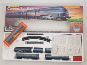 A HORNBY OO gauge 'Coronation Scot' passenger train set together with an additional matching