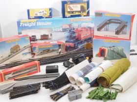A large mixed box of mostly HORNBY OO gauge model railways items to include an incomplete 'Freight