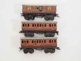 A group of BING O gauge short bogie coaches in LMS livery - G (unboxed) (3)