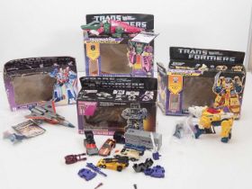 A group of original HASBRO Transformers - all in original boxes but without internal packing