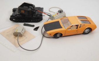 A pair of plastic and tinplate remote control vehicles comprising a De Tomaso Mangusta by unknown