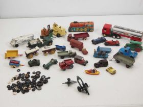 A selection of diecast and tinplate vehicles by DINKY, BRITAINS, BUDDY L and others together with