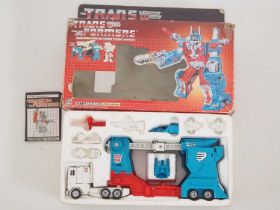 An original HASBRO Transformers Autobot 'Ultra Magnus', appears complete with instructions in