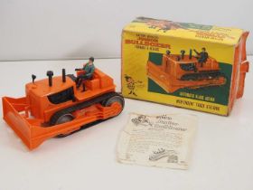 A LOUIS MARX plastic battery operated junior bulldozer in original box with packing piece - one