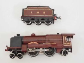 A HORNBY Series O gauge 20V electric No.3 4-4-2 steam locomotive and tender in LMS maroon 'Royal