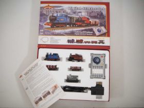 A BACHMANN OO gauge 30-040 digital starter set containing two locomotives, wagons, controller and