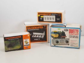 A group of OO and N gauge model railway controllers to include 3 x GAUGEMASTER examples in