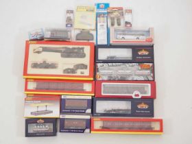 A group of OO gauge rolling stock by HORNBY and others together with various 1:76 scale vehicles and