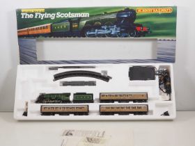 A HORNBY OO gauge 'The Flying Scotsman' passenger train set, appears complete - VG in VG box