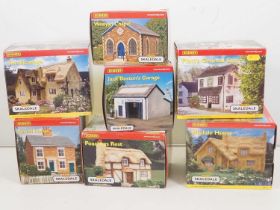 A hamlet of HORNBY SKALEDALE OO gauge resin buildings to include some early release examples - all