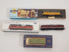 A pair of PIKO HO gauge diesel locomotives in East German and Polish liveries together with an