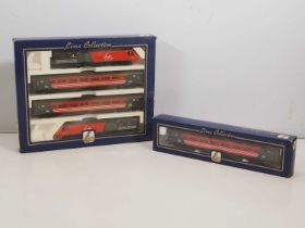 A LIMA OO gauge high speed train pack together with an additional coach all in Virgin Cross