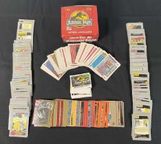 A quantity of 1990's trading cards comprising of JURASSIC PARK 1993 Topps cards, at least one full