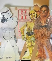 A group of STAR WARS, cardboard character standees to include CHEWBACCA, C-3PO, STORMTROOPER, a STAR