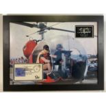 A BOB KANE signed envelope framed in a BATMAN display depicting Batman and Robin in the Batcopter,