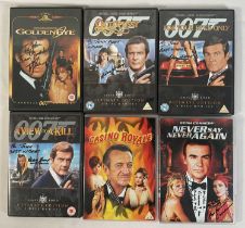 A group of 6 autographed James Bond DVDs comprising CASINO ROYALE (1967) signed by Costume