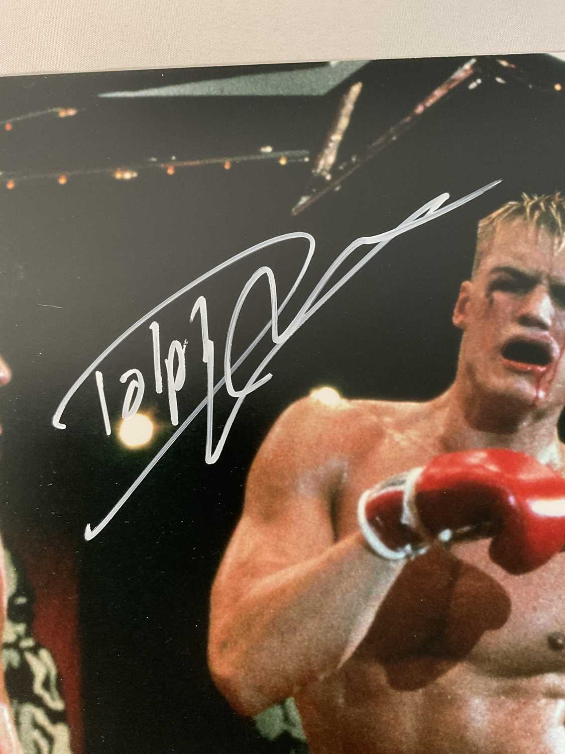 A 16" x 20" photographic still from ROCKY IV signed by SYLVESTER STALLONE and DOLPH LUNDGREN, with - Image 3 of 4
